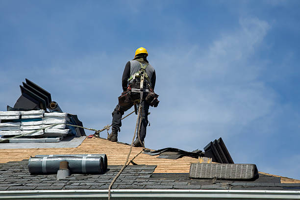 Professional Storm Damage Roof Repair technician working in Redding Ridge, CT